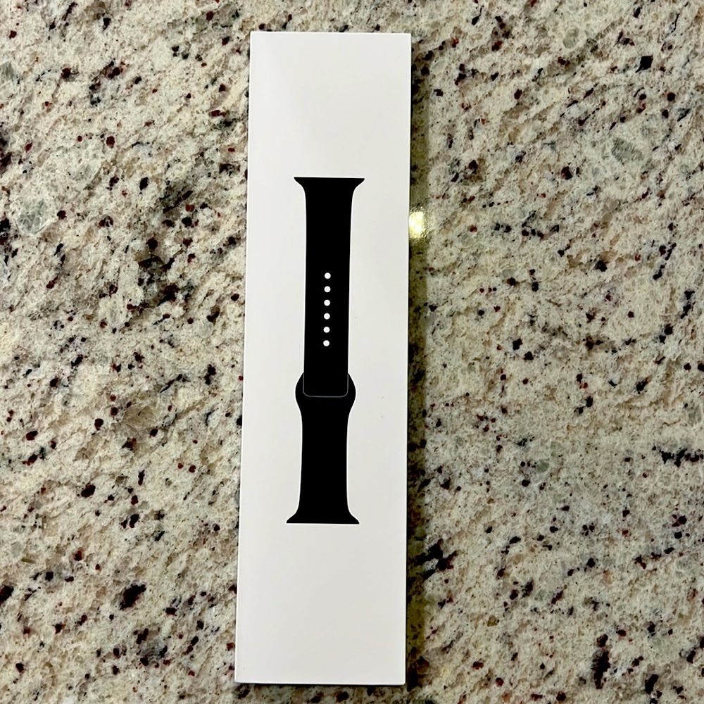 New never opened Apple Watch Sport band in midnight color.Fits 44mm and 45mm